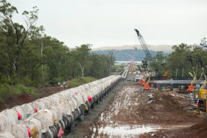 Pipestring exiting mainland cofferdam