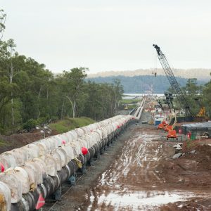 Pipestring exiting mainland cofferdam